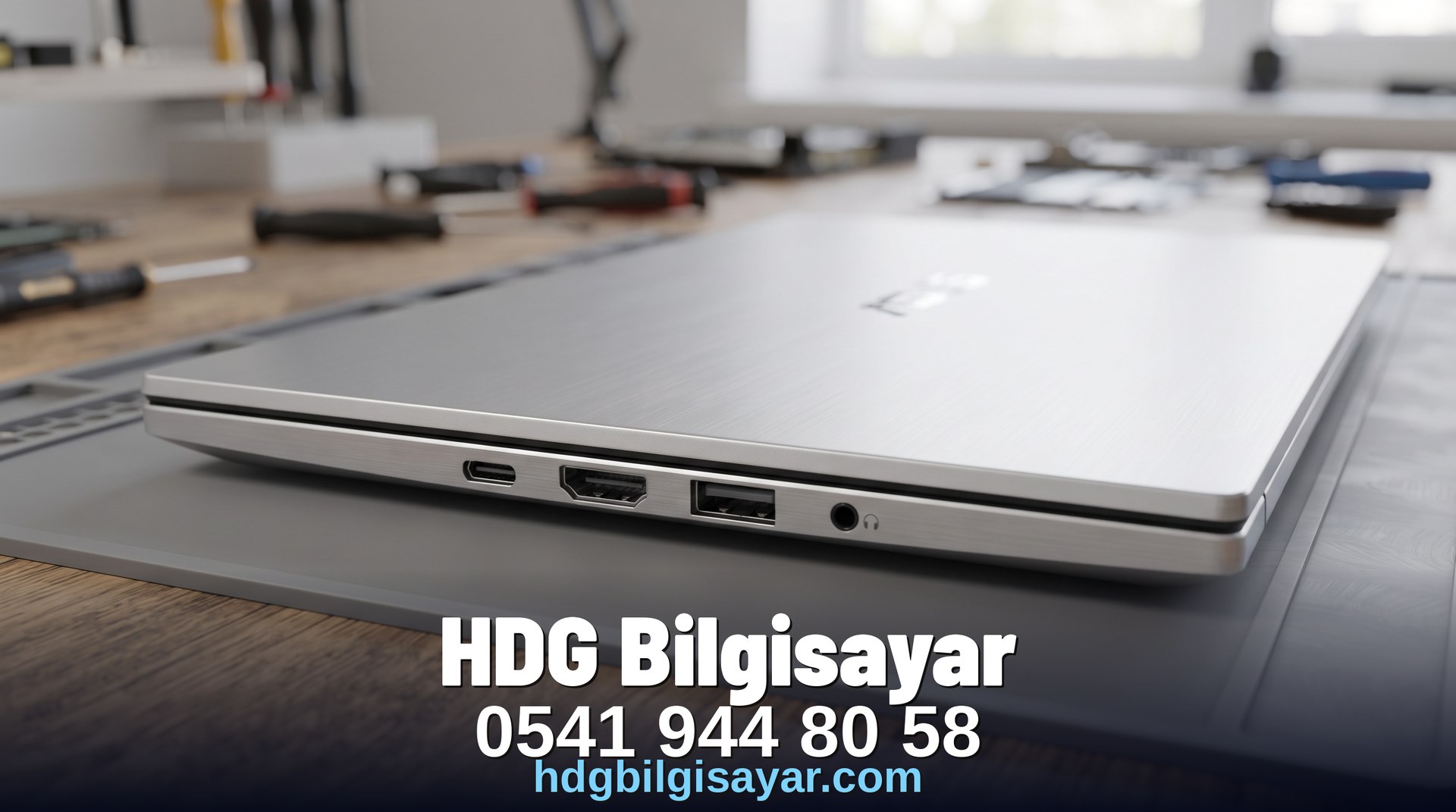 İzmir HDG Bilgisayar — laptop yan / menteşe