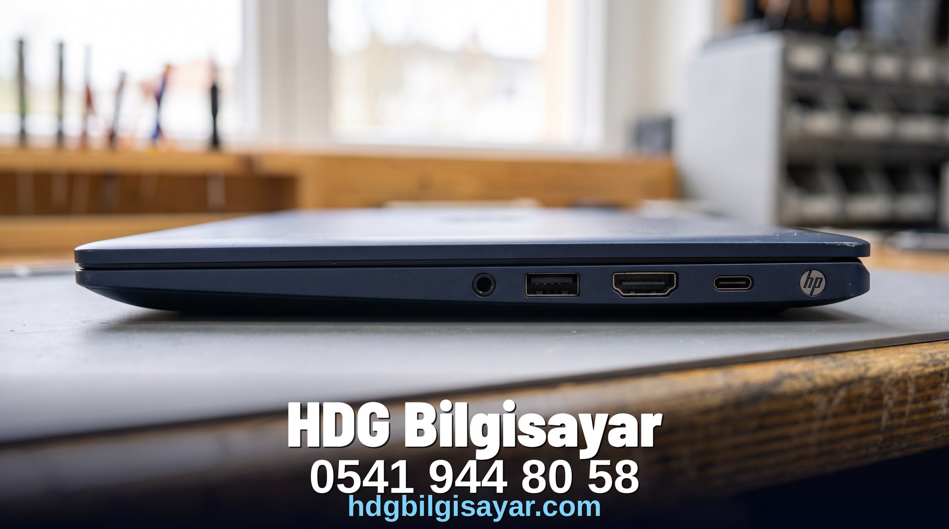 İzmir HDG Bilgisayar — öğrenci laptopu yan görünüm